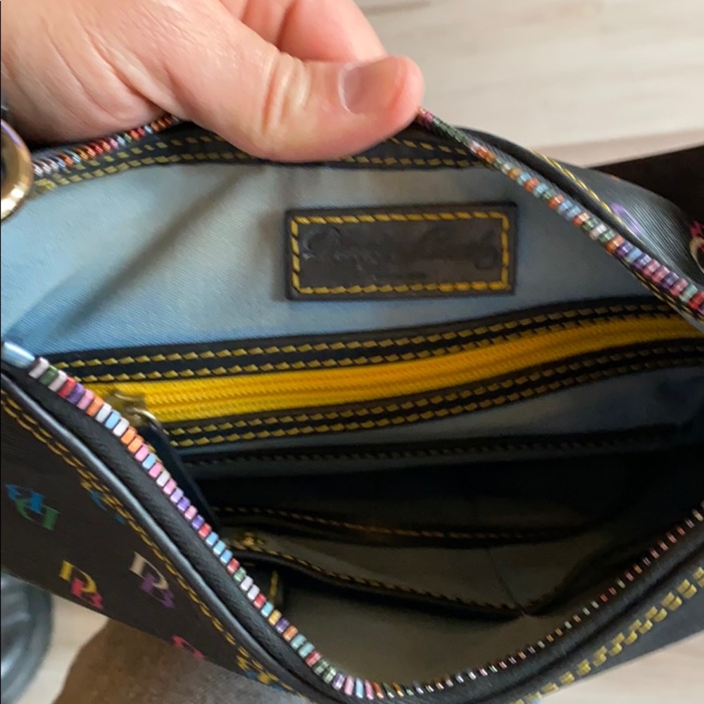 Larger used Dooney & Bourke in good condition. - Picture 3 of 3